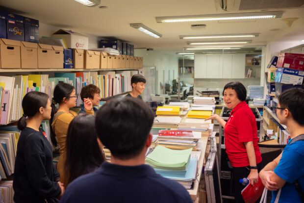 A sneak peek into the orchestra library, teeming with scores and programme notes in a guided VCH tour led by an SSG staff (in red).