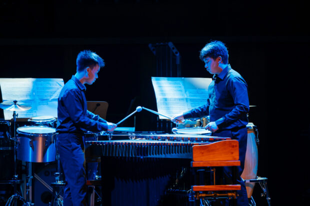 SNYO musician Kilian Muliady (right) in Gene Koshinski’s As One, a multiple percussion duo performance that offers an auditory and visual spectacular for audiences.
