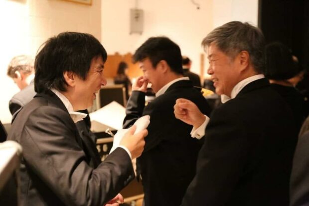 Sharing a post-concert moment with former SSO music director Lan Shui (left). “Choo Hoey gave me my first break by inviting me to join the SSO. He was very exacting. So was Lan Shui – but both conductors had quite different working styles, which helped me improve tremendously.”