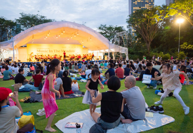 Enjoying the music at our outdoor concert series Music in the Meadow at Gardens by the Bay