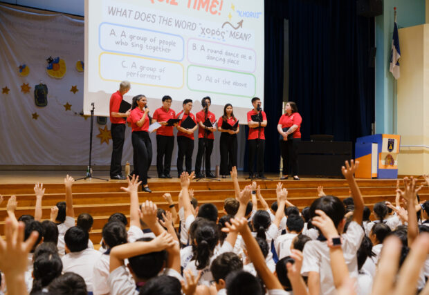Musicians from the Singapore Symphony Choruses sharing about music at a Connect with Music school assembly programme