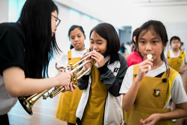 An instrument "petting zoo" where you can try playing different instruments.