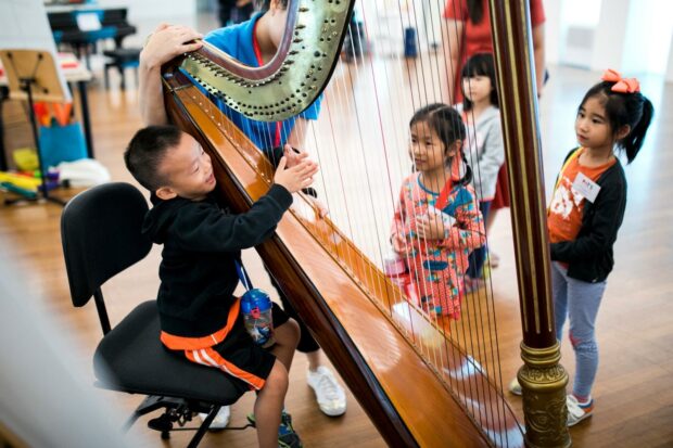Children get to have a hands-on experience with the instruments.