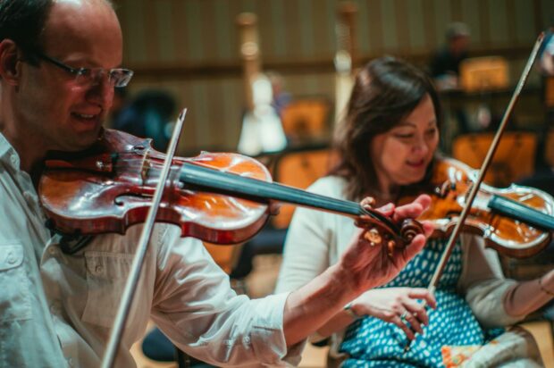 Lynnette with Concertmaster Igor Yuzefovich in 2017.