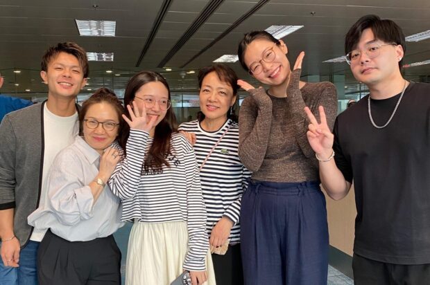Tomoki (leftmost) with fellow SSO musicians on their way to the Asia Orchestra Week 2024 in Kyoto