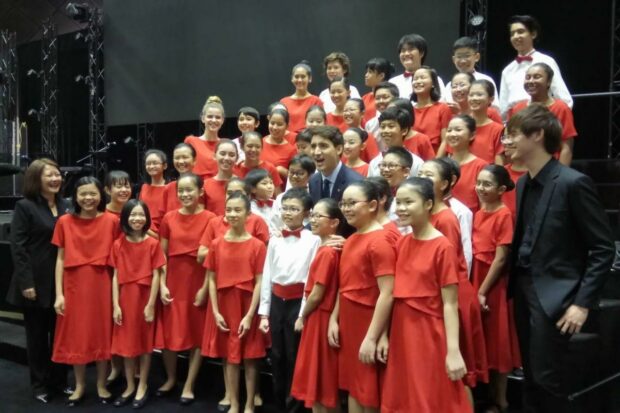 Canadian Prime Minister Justin Trudeau comes backstage to congratulate the Singapore Symphony Children's Choir