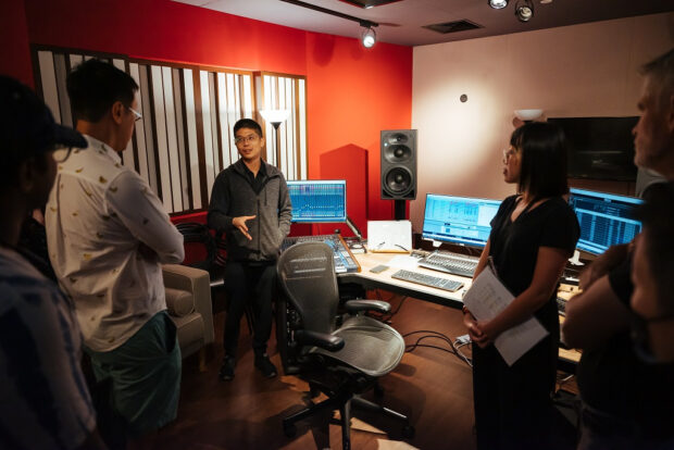 Participants visiting the VCH Rose Studio, our recording control room, during the VCH Backstage  Tours.