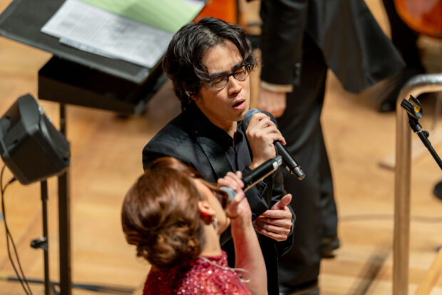 Vocalist Charlie Lim and Syakirah Noble singing Between Two Worlds: Three Songs for Voices and Orchestra arranged by Chok Kerong.