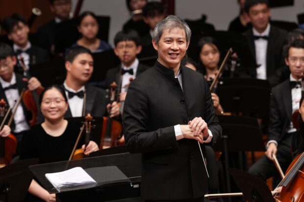 SNYO Music Director Joshua Tan