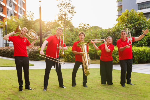 Tomoki and other brass musicians brought smiles (and a little silliness) to their community outreach to Woodlands Health Campus.