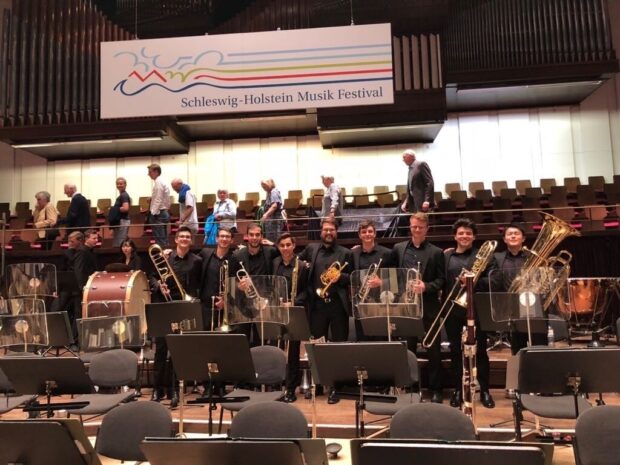Tomoki (rightmost) with the brass section of Schleswig Holstein Music Festival in 2018.